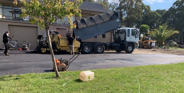 This is a photo of an asphalt driveway which is in the process of being installed by Young Road Tek